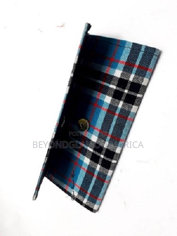 A Women's Ankara Clutch Blue Bag