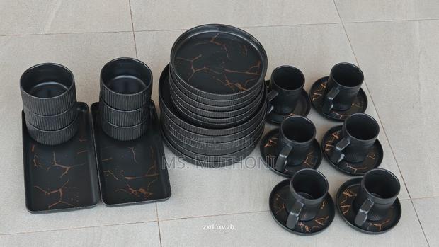 Stone Lain 32-Piece Porcelain Dinnerware Set in Black Gold Pattern. - main view