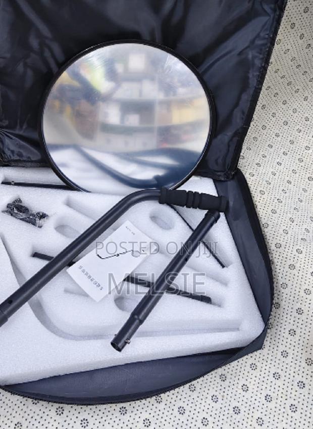 Vehicle Under-Search Security Mirror With Extruded Rubber Rim