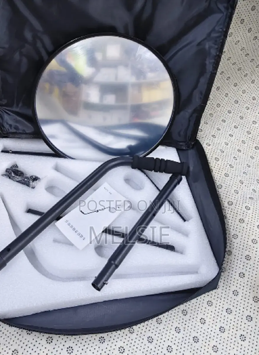 Vehicle Under-Search Security Mirror With Extruded Rubber Rim