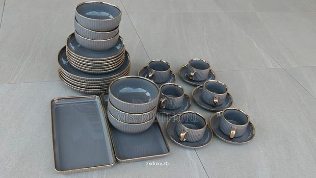 32-Piece Grey Porcelain Dinner Set With Gold Detailing