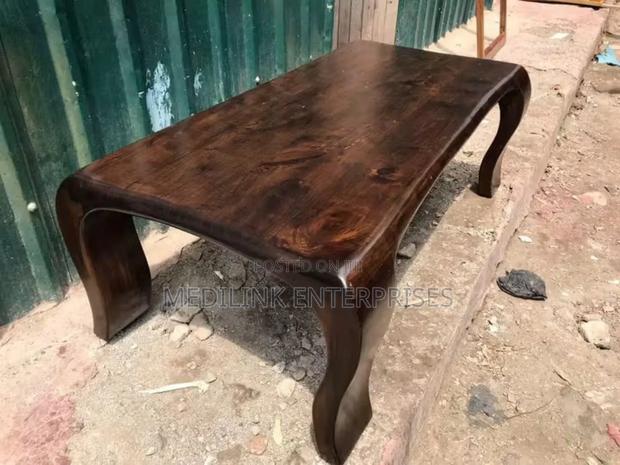 Queen's Legged Walnut Coffee Table - main view