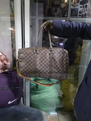 Lv Medium Travel Bags at 1200.Leather