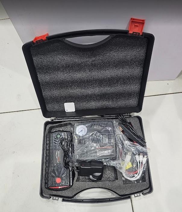Vehicle Jump Starter and Air Pump Emergency Car Battery Booster Kit