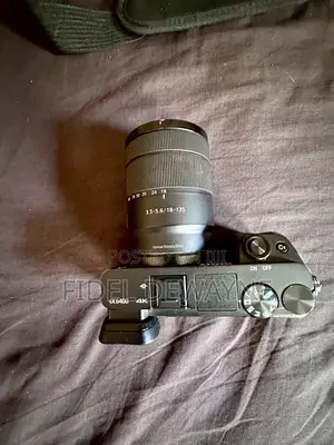 Sony A6400 Camera, Lens 18-135mm And Accessories