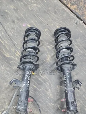 Shock Nissan March K13