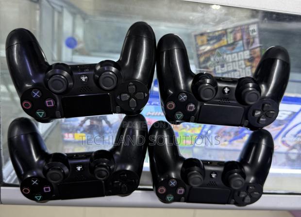 Previously Well Maintained Original Ps4 Pads - main view