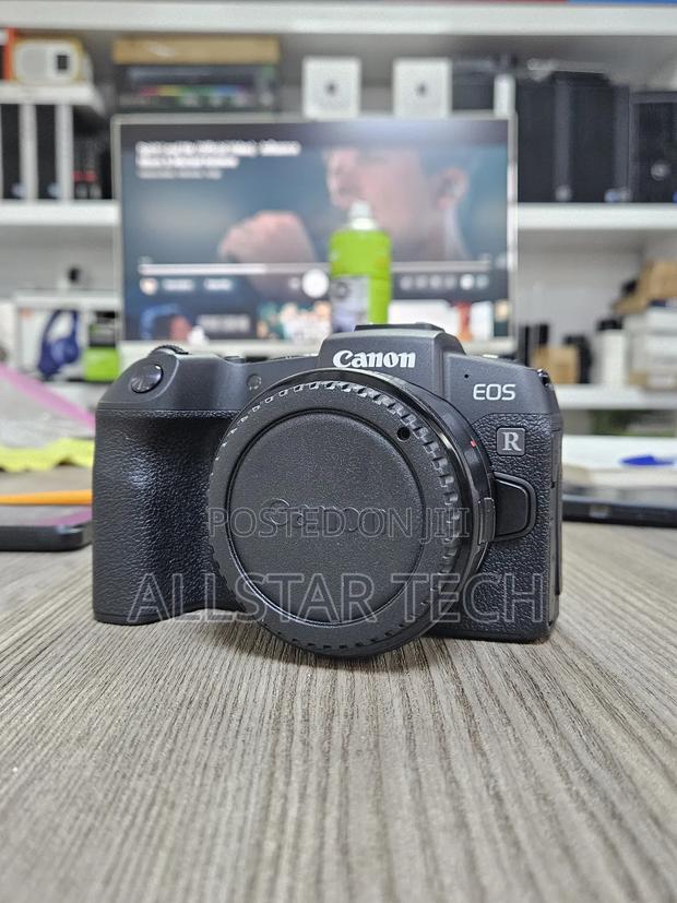 Canon Eos Rp Mirrorless Camera With Rf Adapter - main view