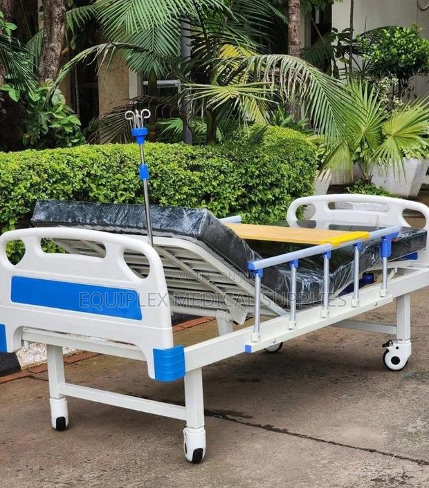 Single Crank Hospital Bed (Plus Mattress, Mackintosh, And Iv Stand)