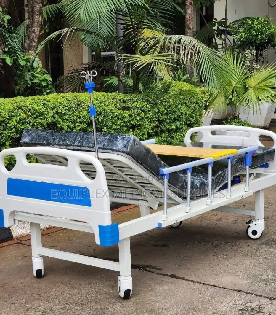Single Crank Hospital Bed (Plus Mattress, Mackintosh, And Iv Stand)