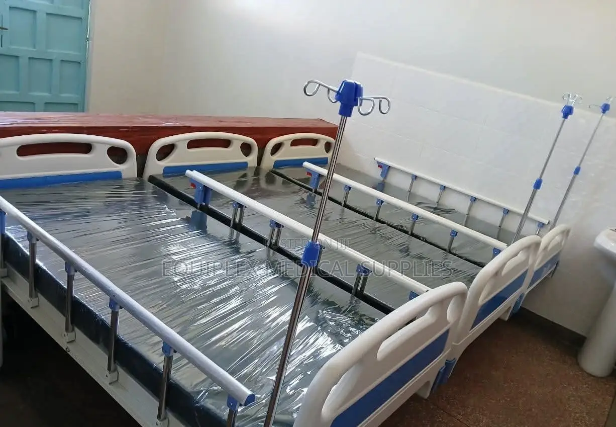 Single Crank Hospital Bed (Plus Mattress, Mackintosh, And Iv Stand)