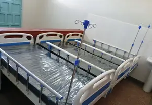 Single Crank Hospital Bed (Plus Mattress, Mackintosh, And Iv Stand)