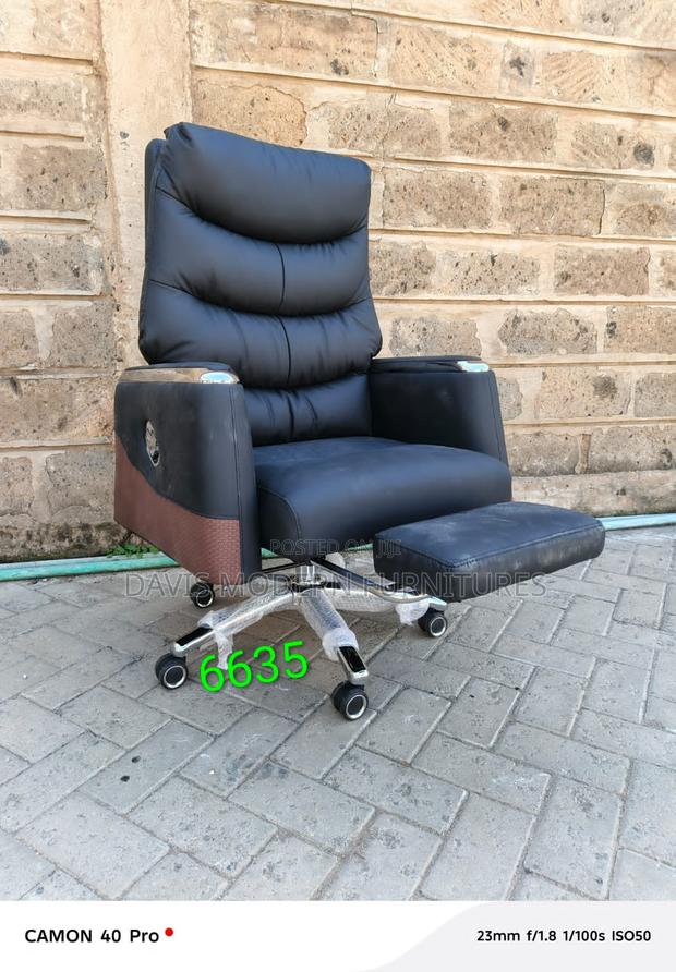 Deluxe Swivel Office Chair With Footrest – Black Upholstery - main view