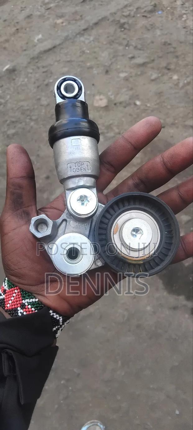 Mazda Demio Tensioner