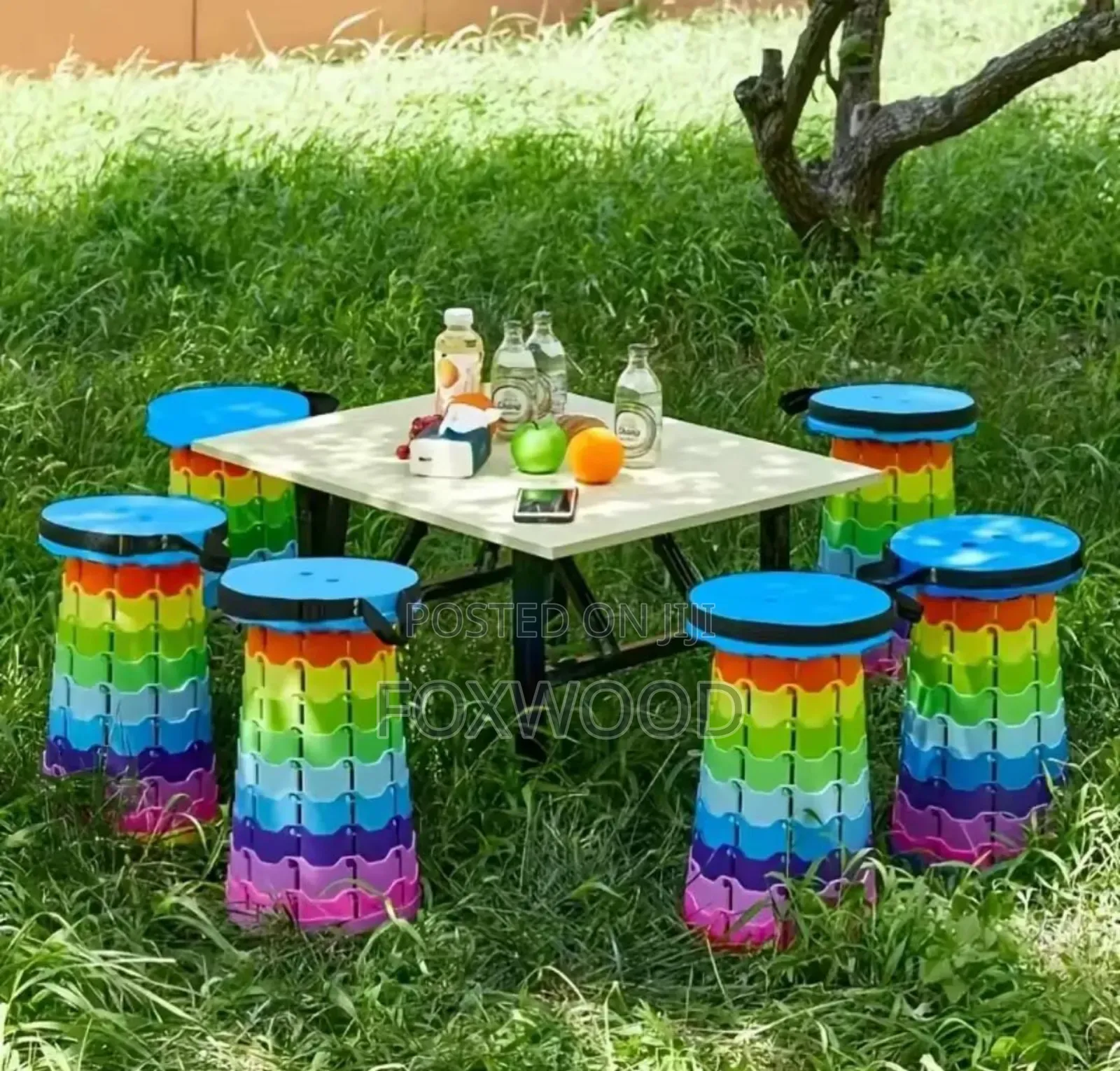 Portable Telescopic Folding Stool With a Rainbow Design.