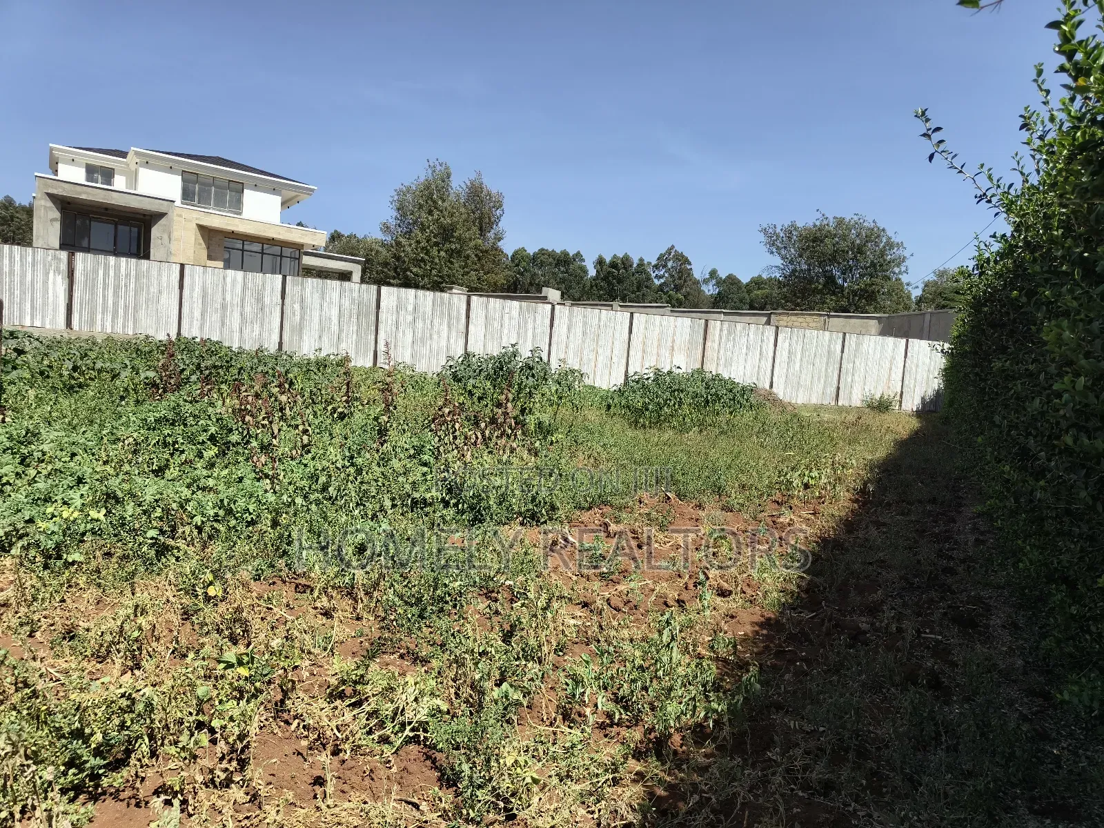 Residential Half Acre Plot in Kerarapon Drive. Gated Red Soil Land