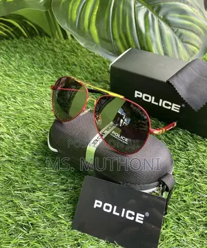 Police Polarized Sunglasses With Red/ Gold Frames and Gold Accents.
