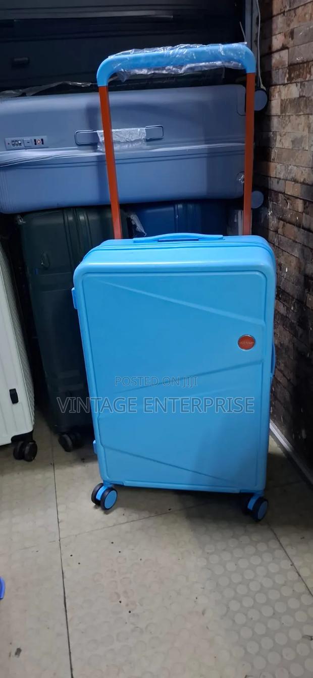 *Single Medium Unbreakable Rubber Suitcases - main view