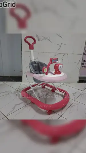 Baby Walker With a Push Handle and Built-in Music and Toys.