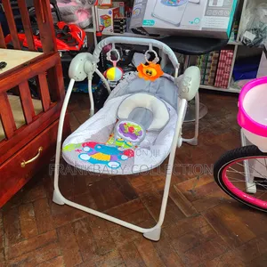 Deluxe Electric Baby Swing Baby Rocker.