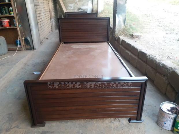 Dark Slatted Wood Bed Size 3 by 6 - main view