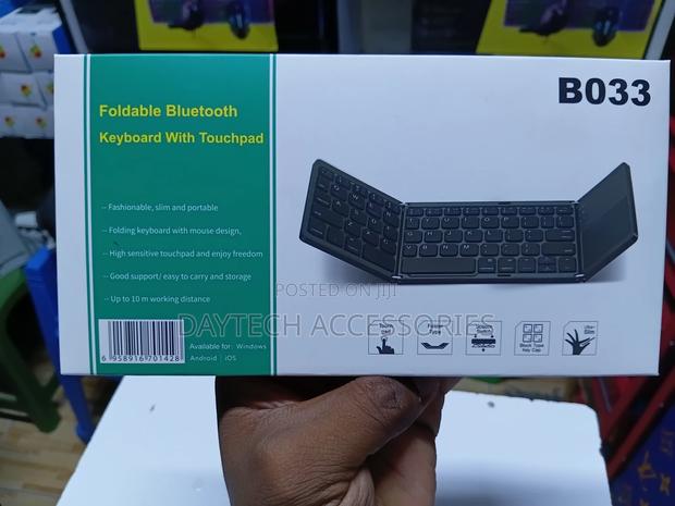 This Is a B033 Foldable Bluetooth Keyboard With Touchpad. - thumbnail 2