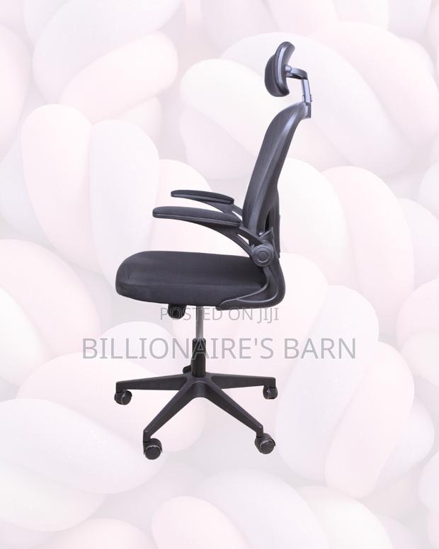 Flip-Up Arms Ergonomic Chair for Tight Spaces — Support That Lasts