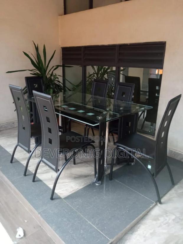 Executive 6 Sitter Glass Dinning Table With Leather Seat - main view