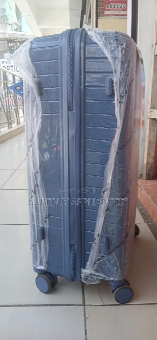 Medium Waterproof Rubber Suitcase With Spinner Wheels - main view