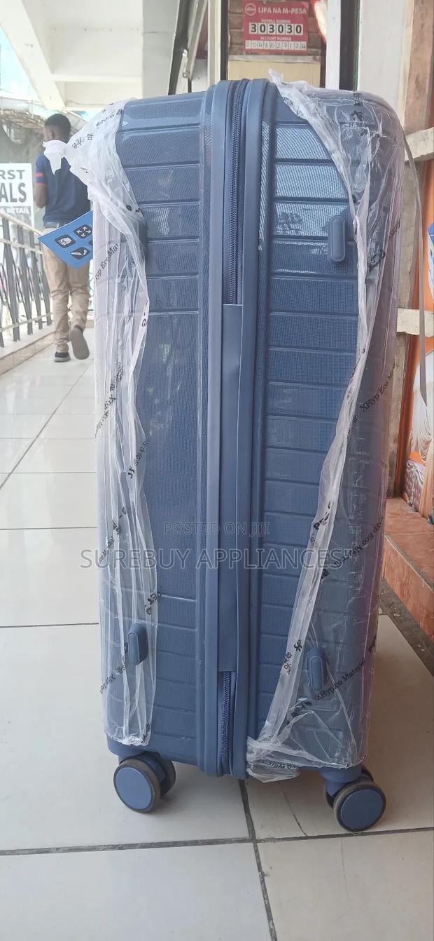 Medium Waterproof Rubber Suitcase With Spinner Wheels - thumbnail 3