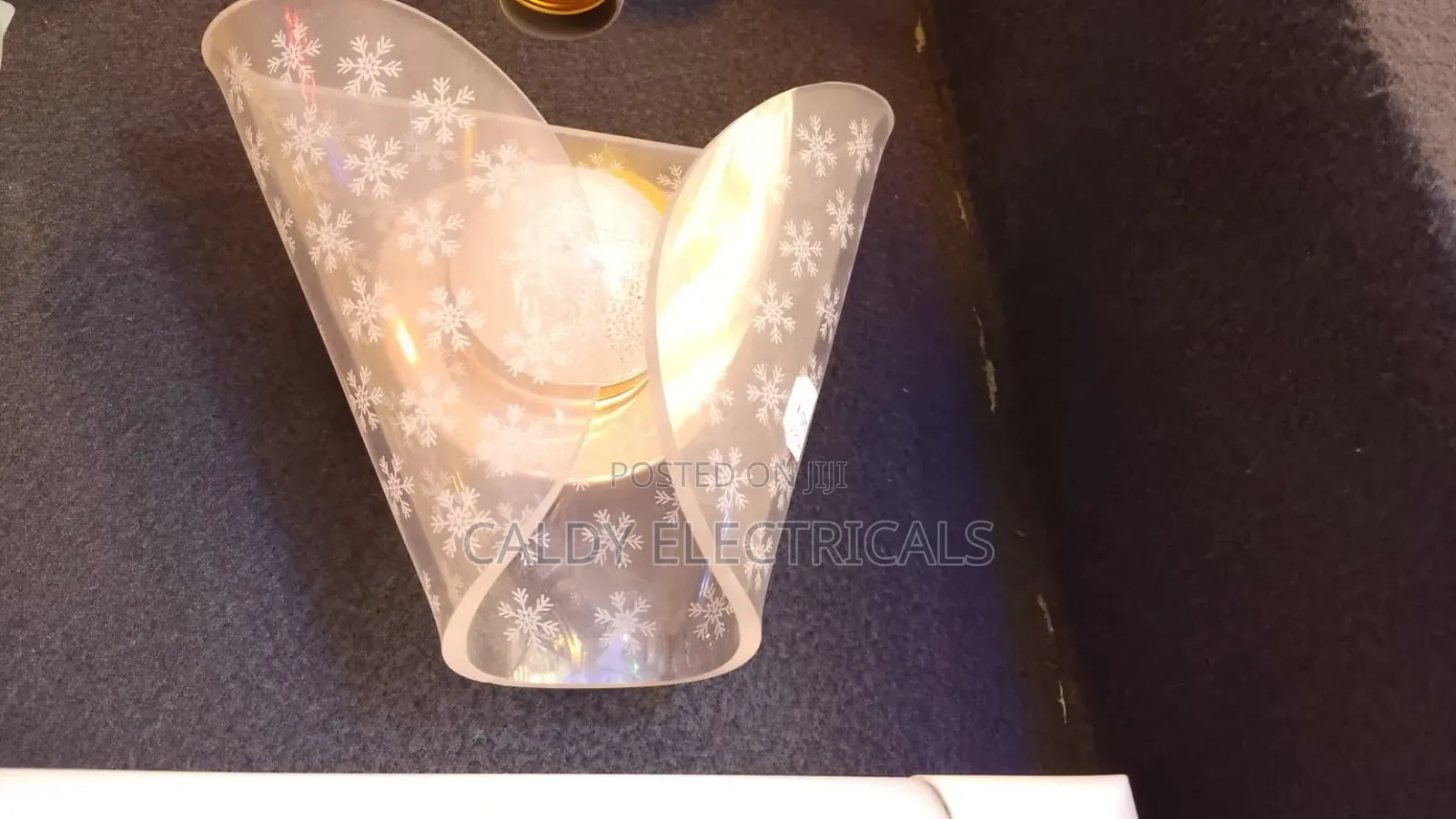 Clear Plastic Snowflake-Patterned Wall Bracket Light