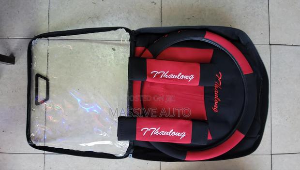 A Set Of 5seater Red Fabric Car Seats Covers