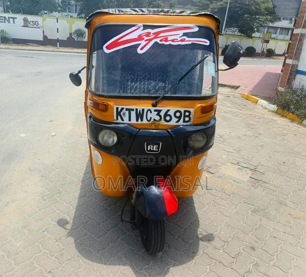 Bajaj RE 2018 Yellow - thumbnail 4