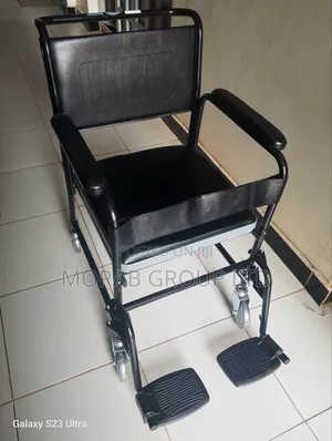 Commode Chair ( With Castors)