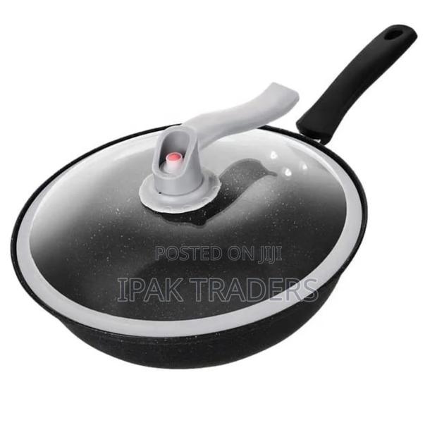 Wok Pan 
32 Cm Diameter 
Non Stick 
Glass Lid