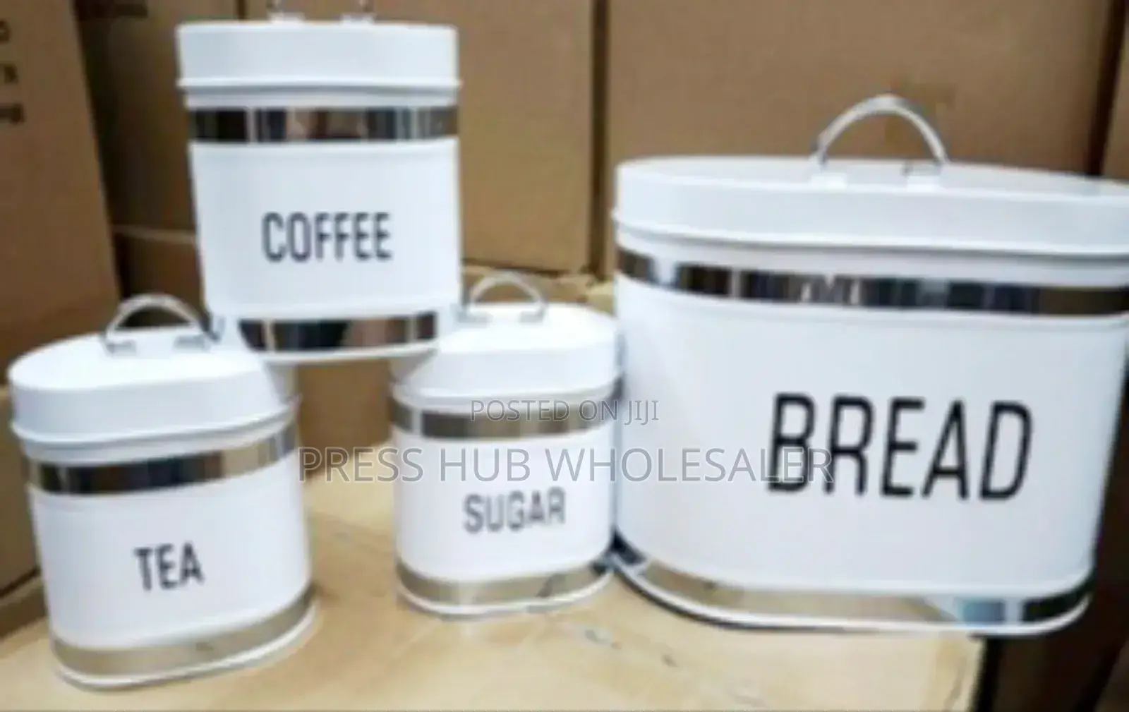 Stainless Steel Four-Piece Bread Bin and Canister Set.