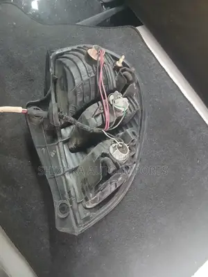 Toyota Duet/Daihatsu Sirion Left Tail Light (M100)