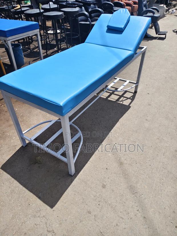 Massage Bed With Navy Blue and White Paint on Frame - main view