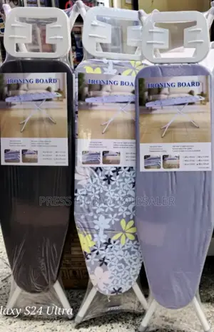 Metallic, Freestanding, and Foldable Ironing Board. : 