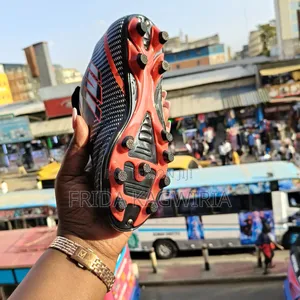 Durable Kids Football Boots For Turf And Pitch