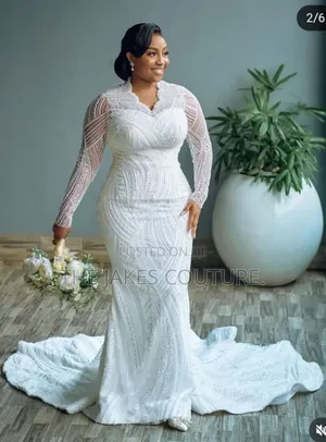 Custom-Made White Wedding Gowns