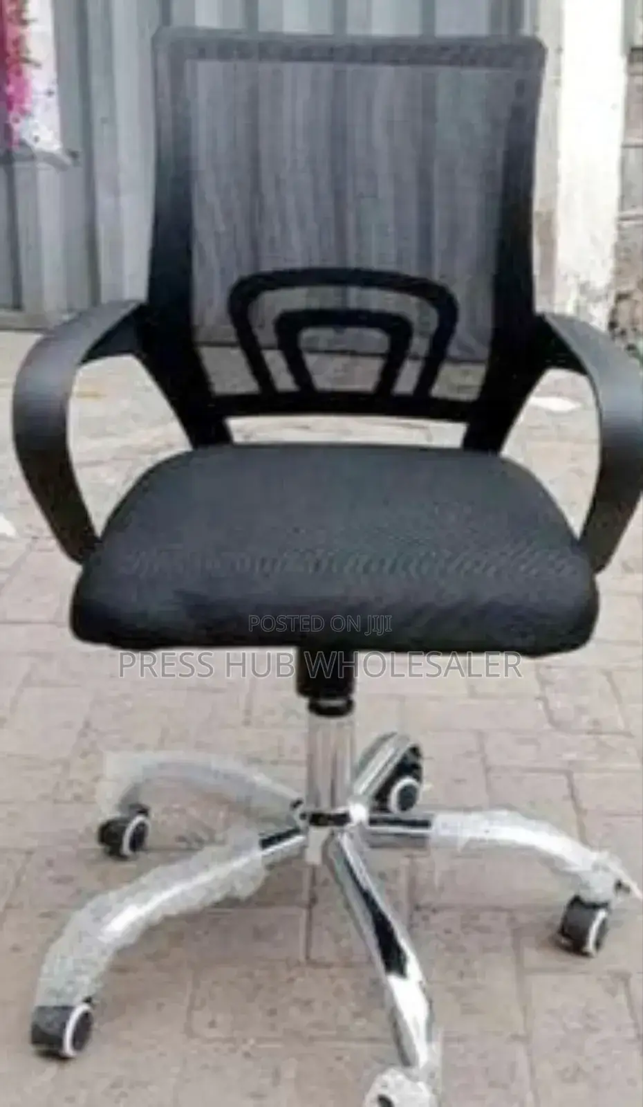 Black Mesh Secretarial Office Chair With a Chrome Base" 