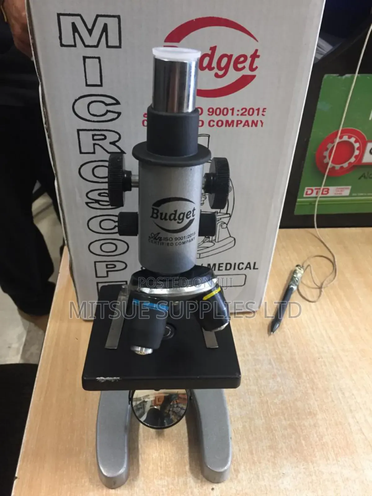 Budget Monocular Microscope Screwed In A Wooden Case