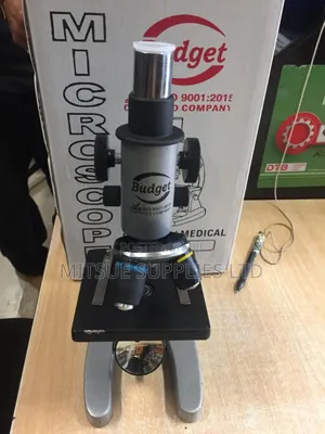 Budget Monocular Microscope Screwed In A Wooden Case