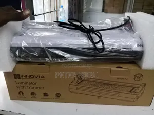 Laminator With 3 Trim Setting.Straight Cut, Wave Cut