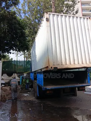 Trucks With Uplifting Cranes Are Available for Jobs and Delivery