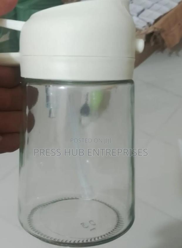 Olive Oil Dispenser and Sprayer Bottle.