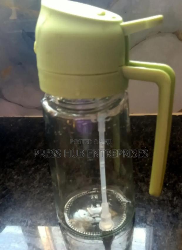 Olive Oil Dispenser and Sprayer Bottle"