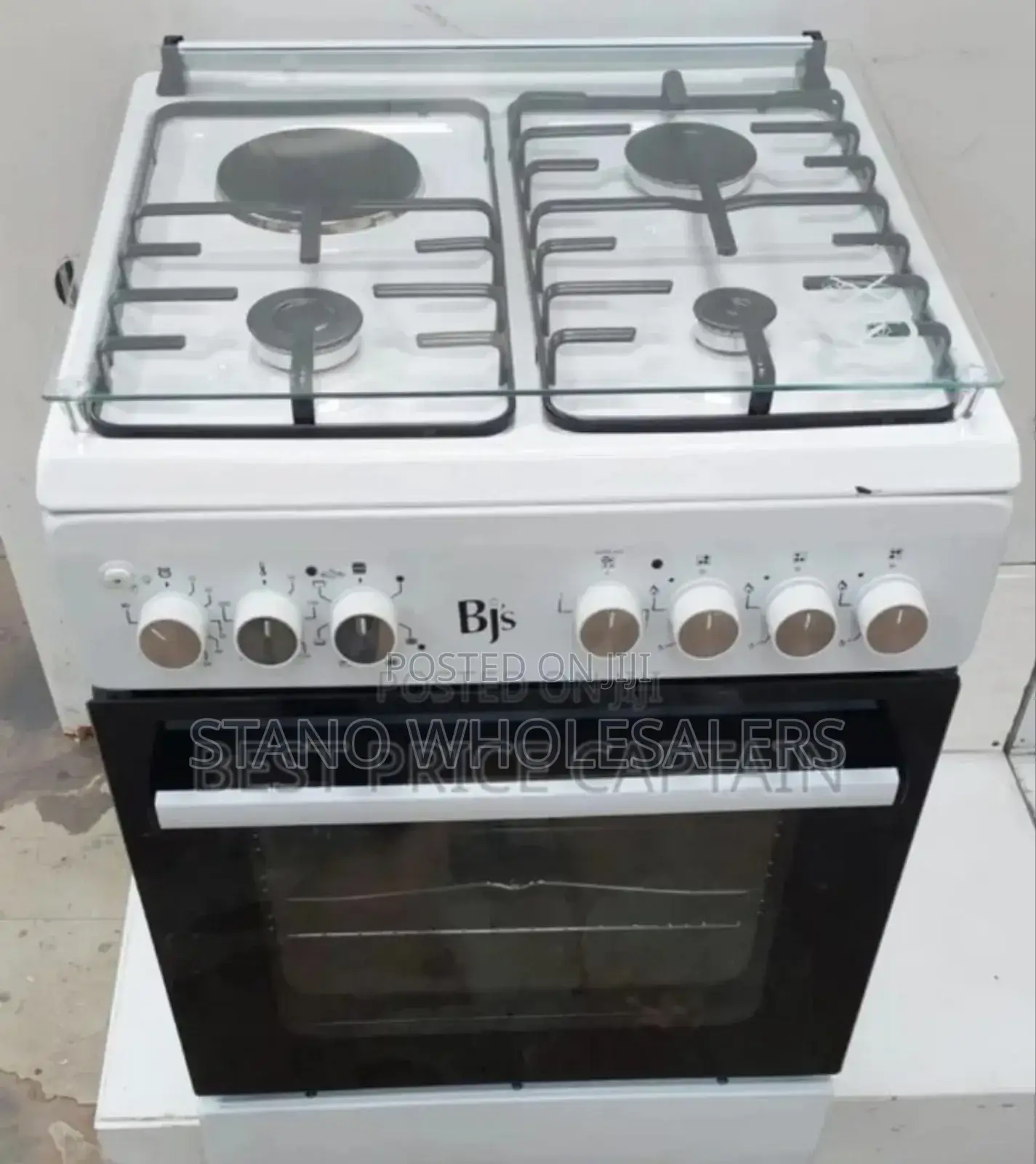 Colour White BJS Cooker Size 60by60. 3+1