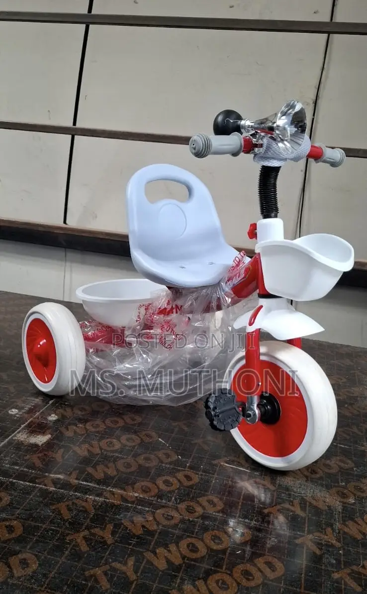 Kids' Red and White Tricycle.